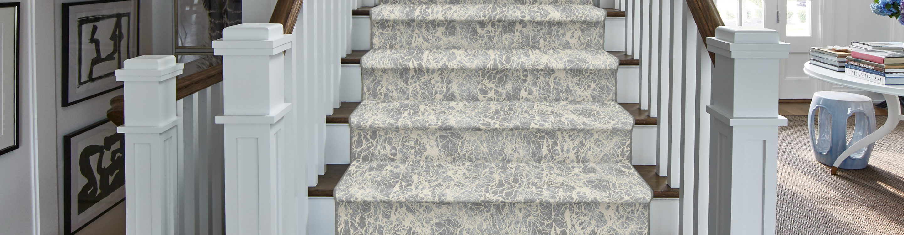 white and gray patterned stair runner in living area
